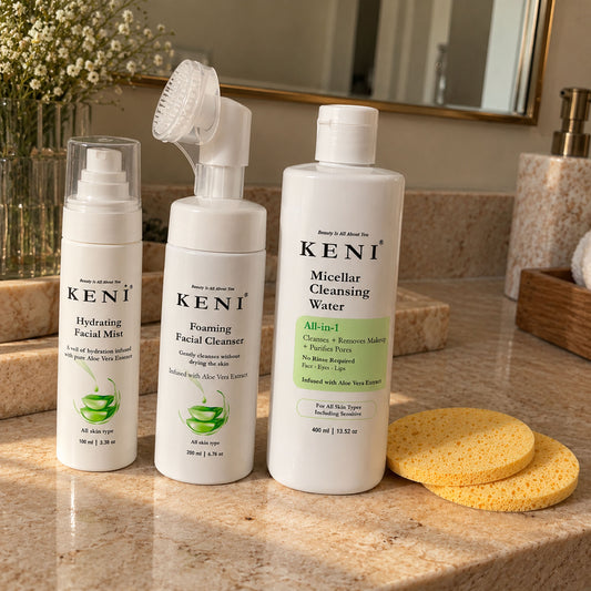 KENI Cosmetics Aloe Vera facial mist, foaming cleanser and micellar water with two sponges on a bathroom counter