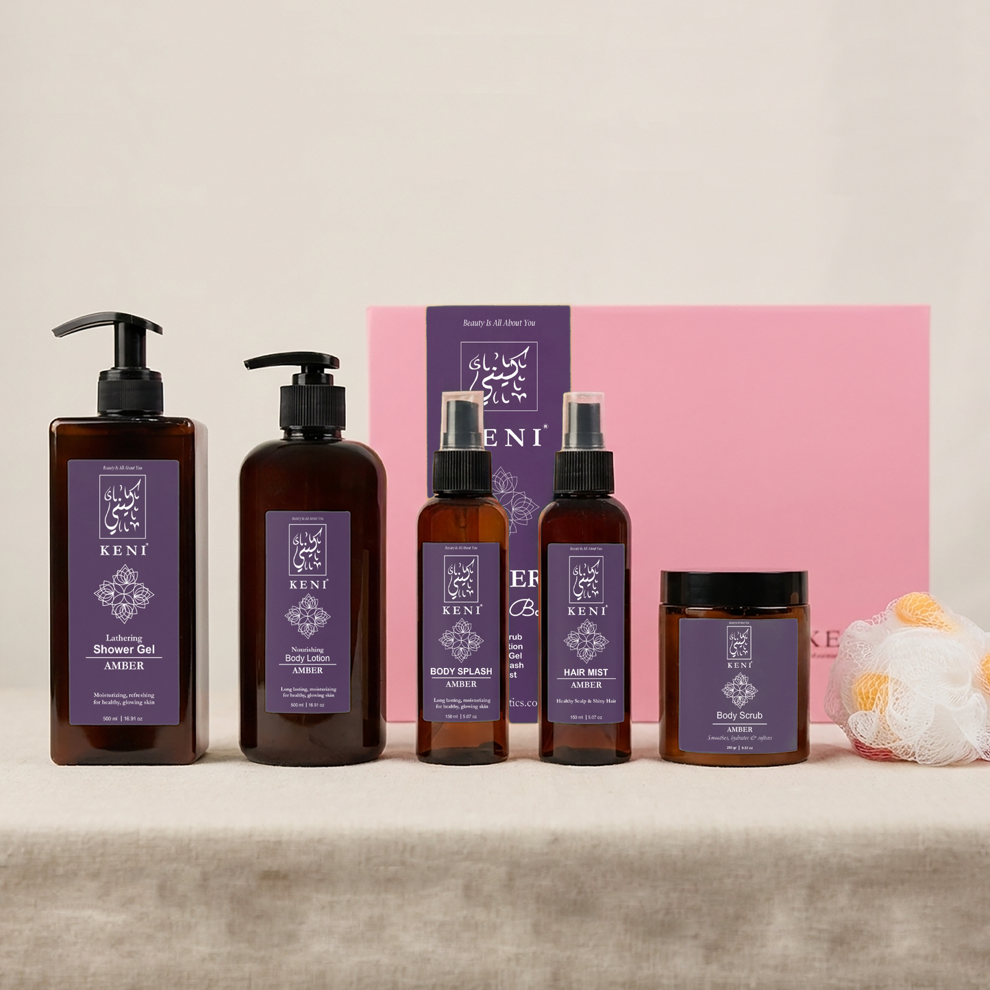KENI Cosmetics Amber Set in Lebanon featuring body lotion, body scrub, hair mist, body splash, and shower gel — a luxurious amber-scented body care collection for smooth, radiant skin