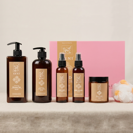 KENI Cosmetics Oud Set in Lebanon featuring body lotion, body scrub, hair mist, body splash, and shower gel — a rich, oriental oud-scented body care collection offering long-lasting luxury and smooth skin.